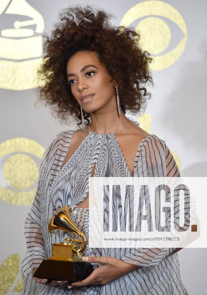 Singer Solange Knowles appears backstage with her awards for Best R&B Performance for Cranes In The Sky during the 59th annual Grammy Awards held at Staples Center in Los Angeles on February 12, 2017. LAP201702121425 CHRISTINExCHEW