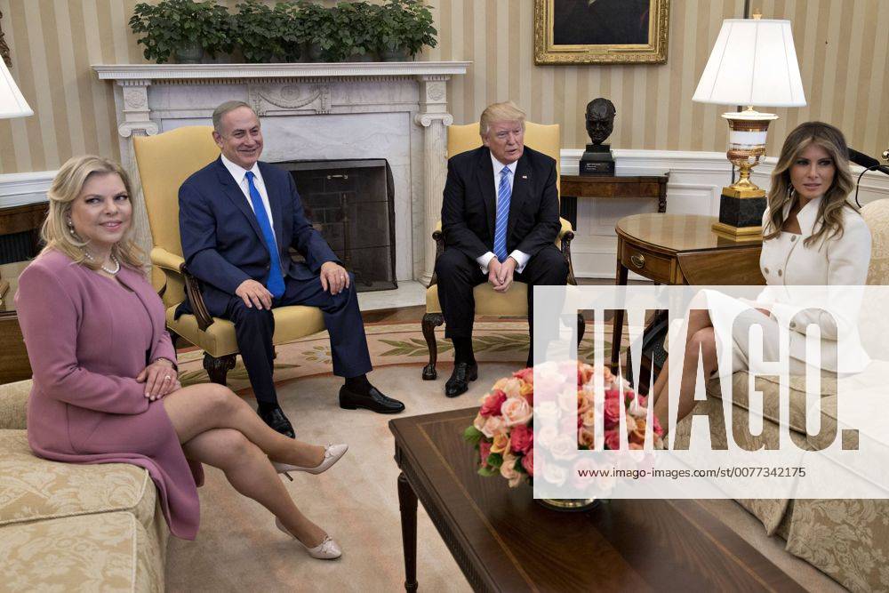 U.S. First Lady Melania Trump, from right, U.S. President Donald Trump, Benjamin Netanyahu, Israel s prime minister, and his wife Sara Netanyahu sit in the Oval Office of the White House in Washington, D.C., U.S., on Wednesday, Feb. 15, 2017. Netanyahu is trying to recalibrate ties with Israel s top ally after eight years of high-profile clashes with former President Barack Obama, in part over Israel s policies toward the Palestinians. Pool photo by Andrew Harrer WAX20170215307 AndrewxHarrer