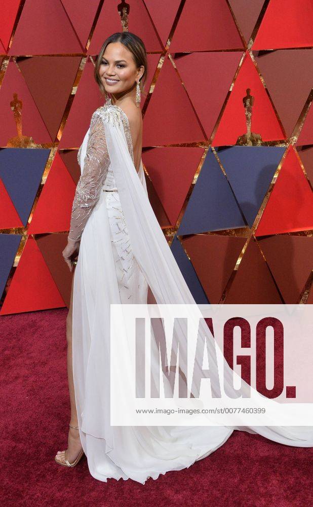 Chrissy Teigen arrives on the red carpet for the 89th annual Academy Awards at the Dolby Theatre in the Hollywood section of Los Angeles on February 26, 2017. LAP20170226654 JIMxRUYMEN