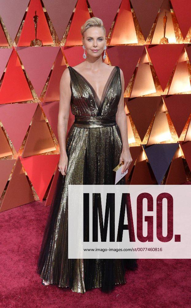 Actress Charlize Theron arrives on the red carpet for the 89th annual Academy Awards at the Dolby Theatre in the Hollywood section of Los Angeles on February 26, 2017. LAP20170226775 JIMxRUYMEN