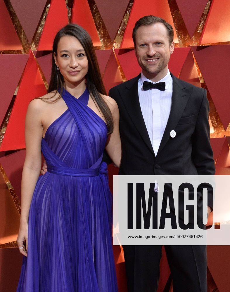 Producer Joanna Natasegara and director Orlando von Einsiedel arrive on the red carpet for the 89th annual Academy Awards at the Dolby Theatre in the Hollywood section of Los Angeles on February 26, 2017. LAP20170226872 JIMxRUYMEN