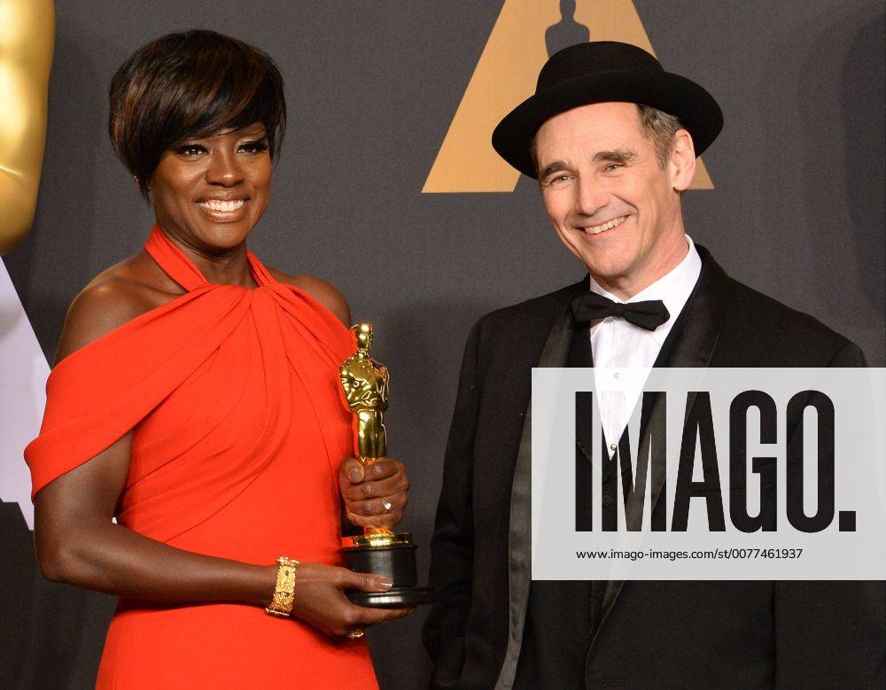 Actress Viola Davis (L), winner of the award for Actress in a Supporting Role for Fences , and presenter Mark Rylance appear backstage during the 89th annual Academy Awards at Loews Hollywood Hotel in the Hollywood section of Los Angeles on February 26, 2017. LAP20170226922 JIMxRUYMEN