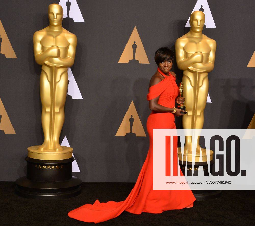 Actress Viola Davis (L), winner of the award for Actress in a Supporting Role for Fences , appears backstage during the 89th annual Academy Awards at Loews Hollywood Hotel in the Hollywood section of Los Angeles on February 26, 2017. LAP20170226925 JIMxRUYMEN