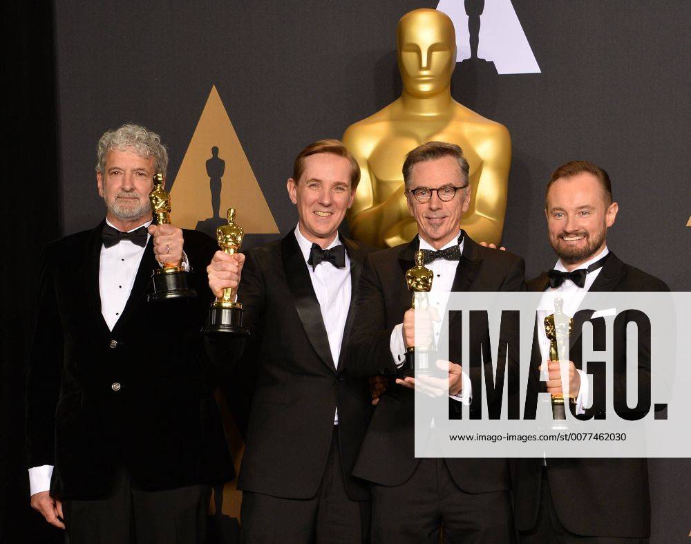 (L-R) Sound mixers Peter Grace, Robert Mackenzie, Kevin O Connell and Andy Wright, winners of the Best Sound Mixing award for Hacksaw Ridge , appear backstage during the 89th annual Academy Awards at Loews Hollywood Hotel in the Hollywood section of Los Angeles on February 26, 2017. LAP20170226938 JIMxRUYMEN
