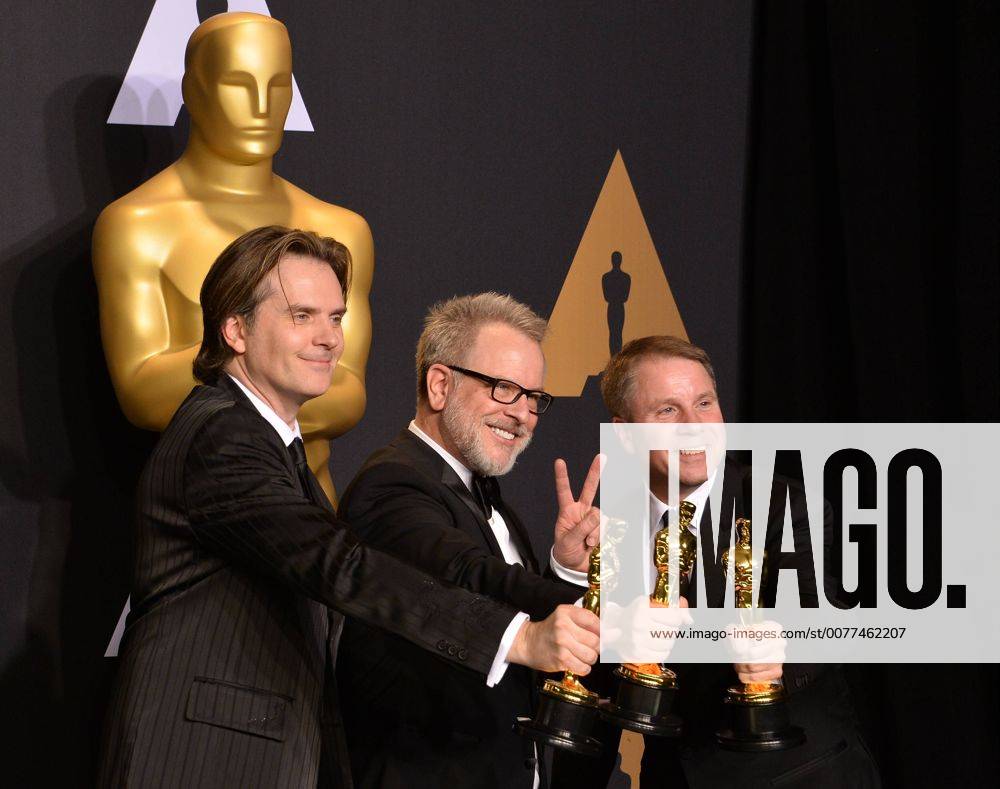 (L-R) Co-directors Byron Howard and Rich Moore and producer Clark Spencer, winners of the Best Animated Feature Film award for Zootopia , appear backstage during the 89th annual Academy Awards at Loews Hollywood Hotel in the Hollywood section of Los Angeles on February 26, 2017. LAP20170226977 JIMxRUYMEN