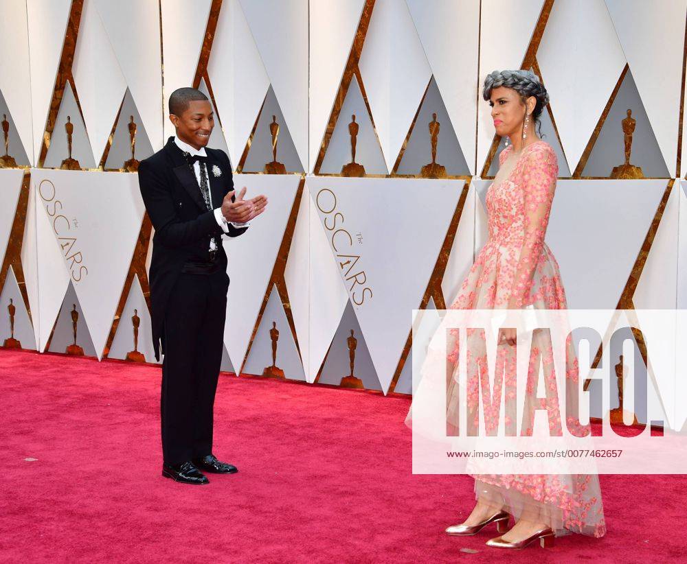 Pharrell Williams and Mimi Valdes arrive on the red carpet for the 89th annual Academy Awards at the Dolby Theatre in the Hollywood section of Los Angeles on February 26, 2017. LAP2017022881 KEVINxDIETSCH