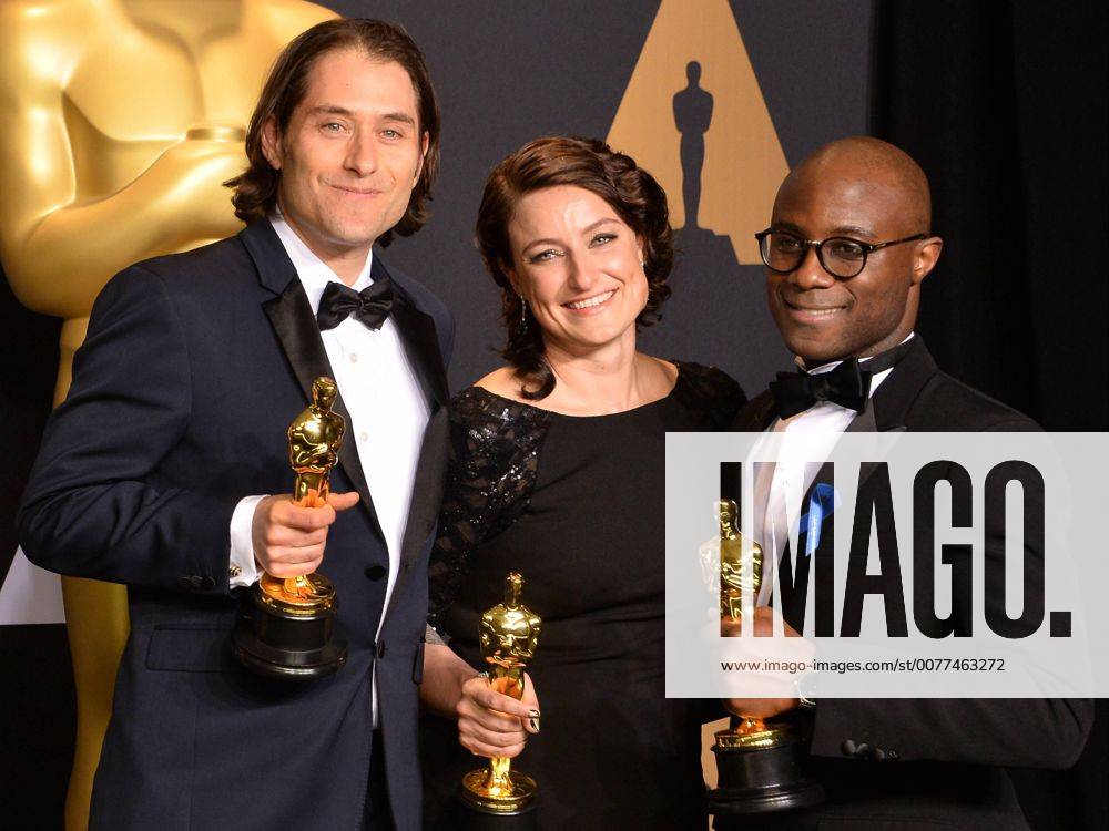 Producer Jeremy Kleiner (L), producer Adele Romanski (C), and writer director Barry Jenkins, winners of the award for Best Picture for Moonlight , appear backstage during the 89th annual Academy Awards at Loews Hollywood Hotel in the Hollywood section of Los Angeles on February 26, 2017. LAP201702261073 JIMxRUYMEN