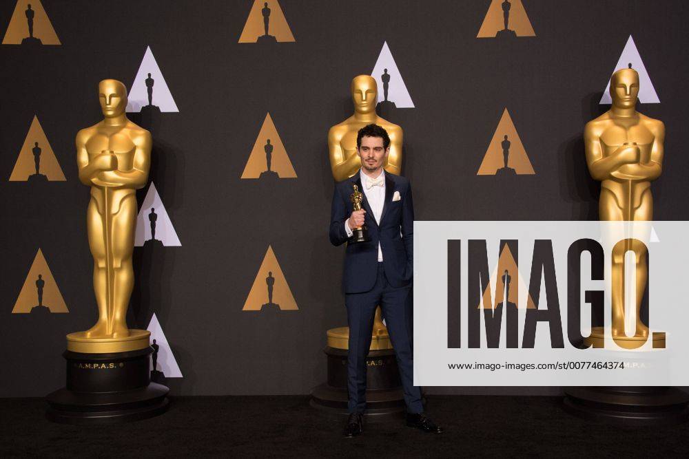 Feb 26, 2017 - Hollywood, California, U.S - DAMIEN CHAZELLE poses backstage with the Oscar for Achievement in directing, for work on La La Landâ during the live ABC Telecast of The 89th Oscars at the Dolby Theatre in Hollywood, CA on Sunday, February 26, 2017. Hollywood U.S. - ZUMAz03_ 20170226_sho_z03_629
