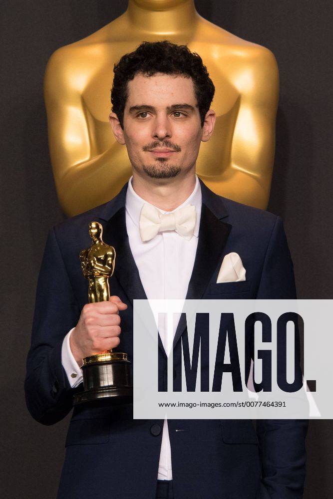 Feb 26, 2017 - Hollywood, California, U.S - DAMIEN CHAZELLE poses backstage with the Oscar for Achievement in directing, for work on La La Landâ during the live ABC Telecast of The 89th Oscars at the Dolby Theatre in Hollywood, CA on Sunday, February 26, 2017. Hollywood U.S. - ZUMAz03_ 20170226_sho_z03_628
