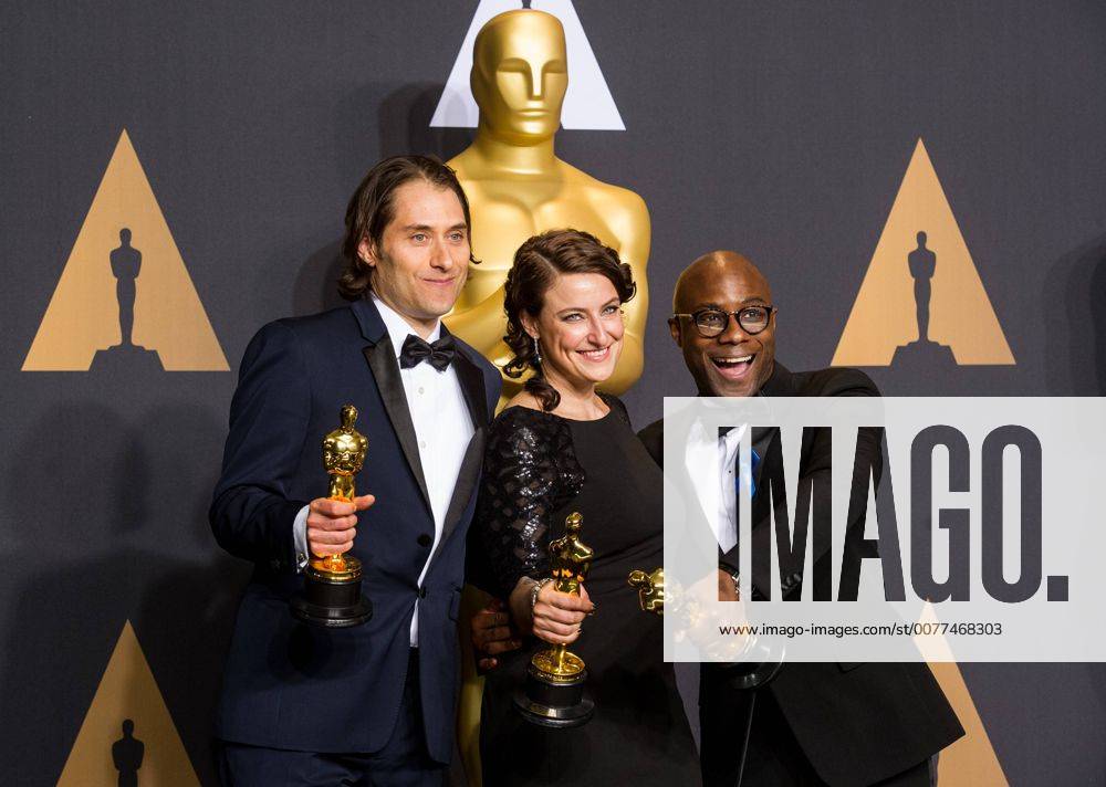 (L-R) Producers Jeremy Kleiner, Adele Romanski and director Barry Jenkins, winners of Best Picture Moonlight , pose at press room of the 89th Academy Awards at the Dolby Theater in Los Angeles, the United States, on Feb. 26, 2017. ) (zjy) U.S.-LOS ANGELES-OSCAR-AWARD YangxLei