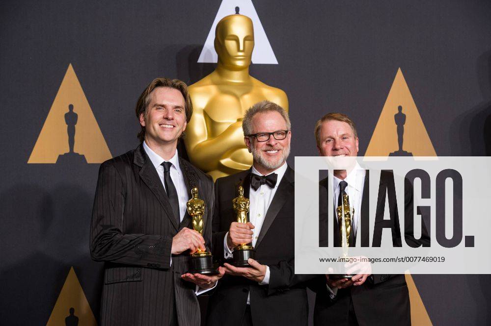 (L-R) Co-directors Byron Howard and Rich Moore and producer Clark Spencer, winners of Best Animated Feature Film Zootopia , pose at press room of the 89th Academy Awards at the Dolby Theater in Los Angeles, the United States, on Feb. 26, 2017. ) (zjy) U.S.-LOS ANGELES-OSCAR-AWARD YangxLei