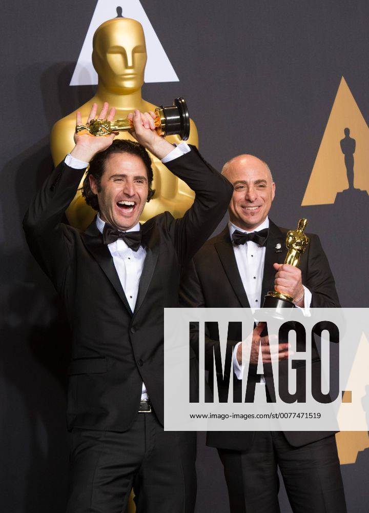 Director Alan Barillaro and producer Marc Sondheimer pose after winning the Best Animated Short Film award for Piper at press room of the 89th Academy Awards at the Dolby Theater in Los Angeles, the United States, on Feb. 26, 2017. )(zf) U.S.-LOS ANGELES-OSCAR-AWARD YangxLei