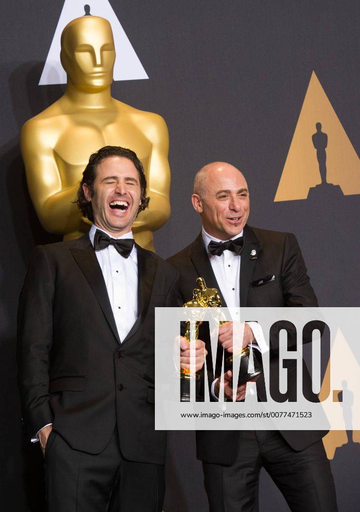 Director Alan Barillaro and producer Marc Sondheimer pose after winning the Best Animated Short Film award for Piper at press room of the 89th Academy Awards at the Dolby Theater in Los Angeles, the United States, on Feb. 26, 2017. )(zf) U.S.-LOS ANGELES-OSCAR-AWARD YangxLei