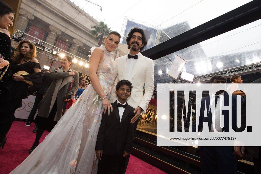 Feb 26, 2017 - Hollywood, California, U.S. - HAILEE STEINFED, SUNNY PAWAR, and Oscar nominee DEV PATEL arrive on the red carpet of The 89th Oscars at the Dolby Theatre in Hollywood, CA on Sunday, February 26, 2017. Hollywood U.S. - ZUMAz03_ 20170226_sho_z03_834