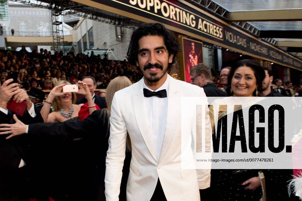 Feb 26, 2017 - Hollywood, California, U.S. - DEV PATEL, Oscar nominee, and mother arrives on the red carpet of The 89th Oscars at the Dolby Theatre in Hollywood, CA on Sunday, February 26, 2017. Hollywood U.S. - ZUMAz03_ 20170226_sho_z03_813