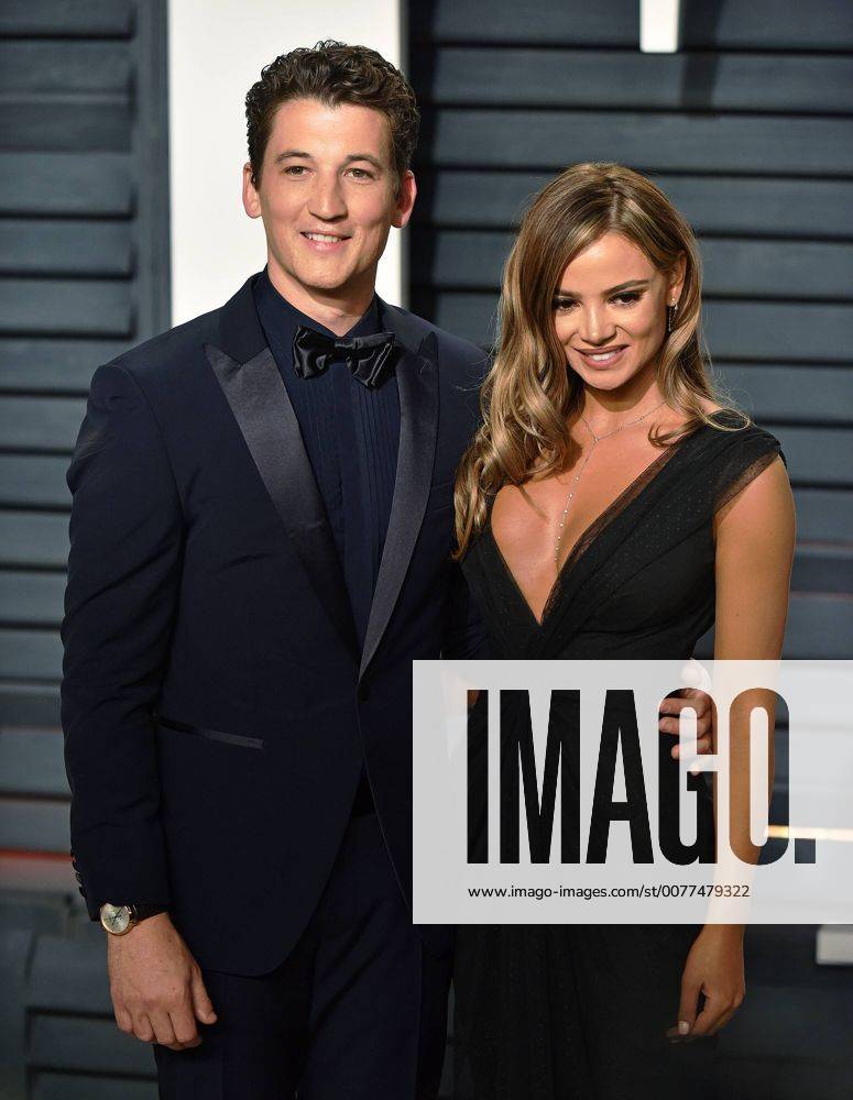 Actor Miles Teller (L) and model Keleigh Sperry attend the Vanity Fair Oscar Party at the Wallis Annenberg Center for the Performing Arts in Beverly Hills, California on February 26, 2017. LAP201702262147 CHRISTINExCHEW