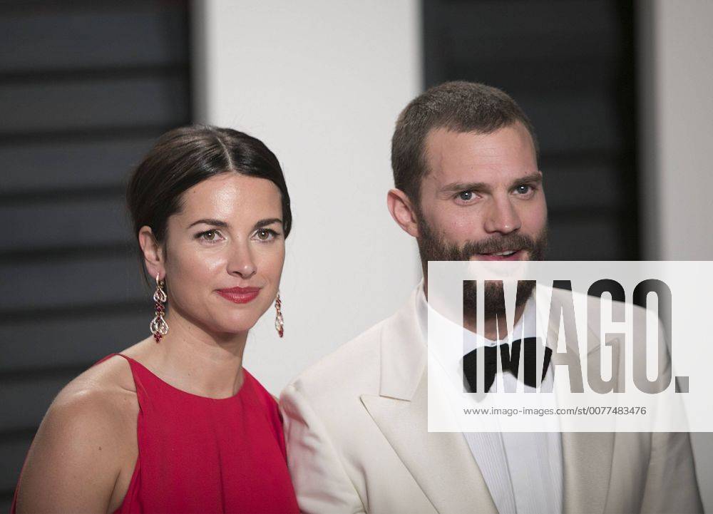 Beverly Hills, California, U.S - Amelia Warner, Jamie Dornan on the red carpet at the 2017 Vanity Fair Oscar Party held at the Wallis Annenberg Center in Beverly Hills, California, Sunday February 26, 2017. JAVIER ROJAS PI Beverly Hills U.S. - ZUMAp124 20170227_zaa_p124_126