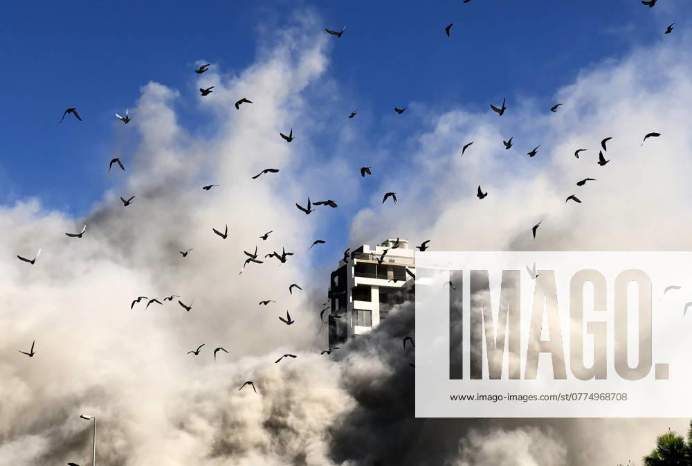 KW43 (241023) -- BEIRUT, Oct. 23, 2024 -- Smoke billows from a building after an Israeli airstrike in the southern suburb of Beirut, Lebanon, Oct. 22, 2024. The death toll from Israeli airstrikes on Lebanon since the beginning of the Israel-Hezbollah conflict has reached 2,530, with injuries up to 11,803, according to a report released Tuesday by the Disaster Risk Management Unit at the Lebanese Council of Ministers. ) LEBANON-BEIRUT-ISRAELI AIRSTRIKE BilalxJawich