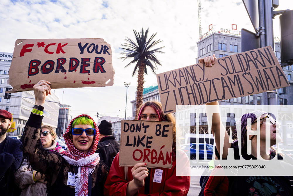 Protestors march through Warsaw in support of Right to Asylum - 27 Oct 2024 Protestors hold placards expressing their opinion during the rally. A collection of activist groups and supporters came together to protest against the Polish government plans to suspend the right to asylum, something they believe is a human right. On the 15th of October, the Polish government announced a new migration strategy for 2025-2030, which proposes the ëtemporary and territorial suspension of the right to apply for asylumí. While it is claimed this will resolve the stand-off on the Polish-Belarusian forest border, the wording is broad enough to encompass other contexts. The protestors believe the right to asylum is a human right. Suspending it contradicts A