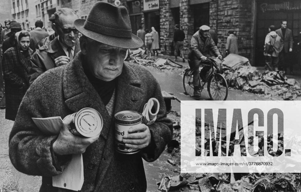 As battle starts to save the treasures of Florence As battle starts to save the treasures of Florence, each family fights its own battle - against hunger and disease, during floods and mud slides. Date: 13.11.1966 (c) Times Retrocon Weather