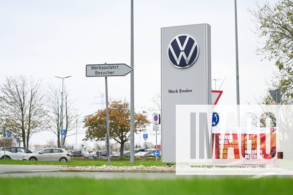 Volkswagen Emden plant in crisis A sign in front of the Volkswagen Emden plant reads Emden plant Next to it are banners from IG Metall Küste Europes largest carmaker wants to close three plants in Germany and lay off tens of thousands of employees Emden Lower Saxony Germany