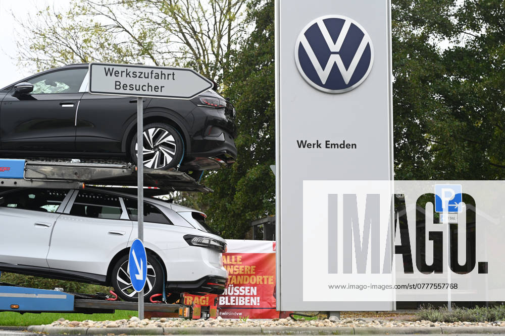 Volkswagen Emden plant in crisis View of a car transport with new E cars from the Emden plant Europes largest carmaker wants to close three plants in Germany and lay off tens of thousands of employees Emden Lower Saxony Germany