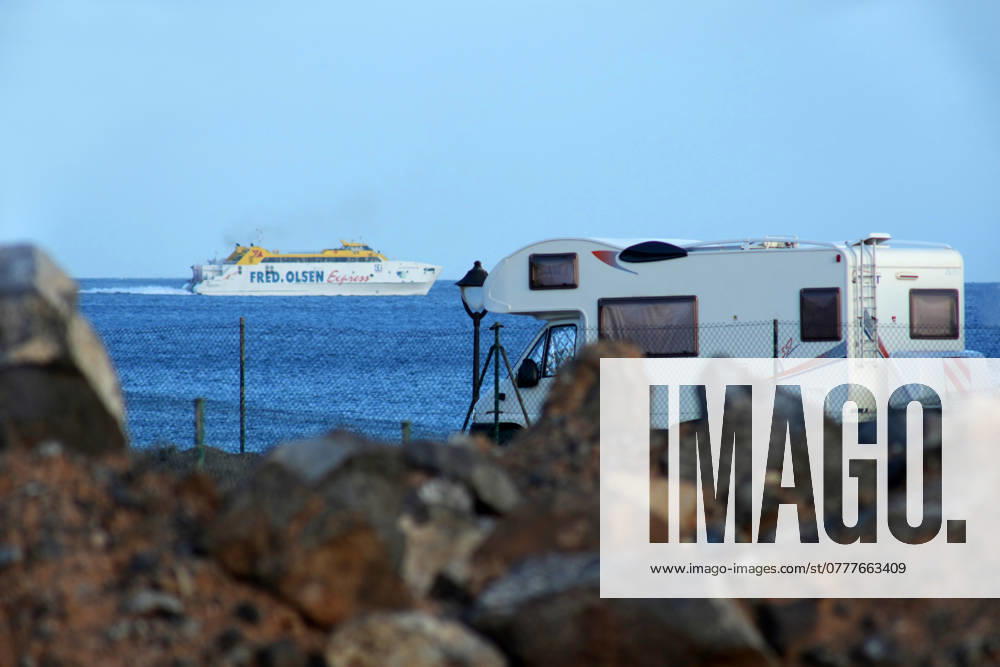 Camper Spain 20241028, Camper on Lanzarote volcanic island on the Canary Islands in Playa Blanca, with ferry to Fuerteventura
