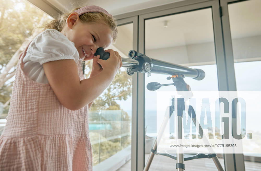 Young kids, telescope and home learning about planets, stars and sky in space. Excited, curious and happy girl play, watch and study view of universe, science and moon for fun educational development. model released property released