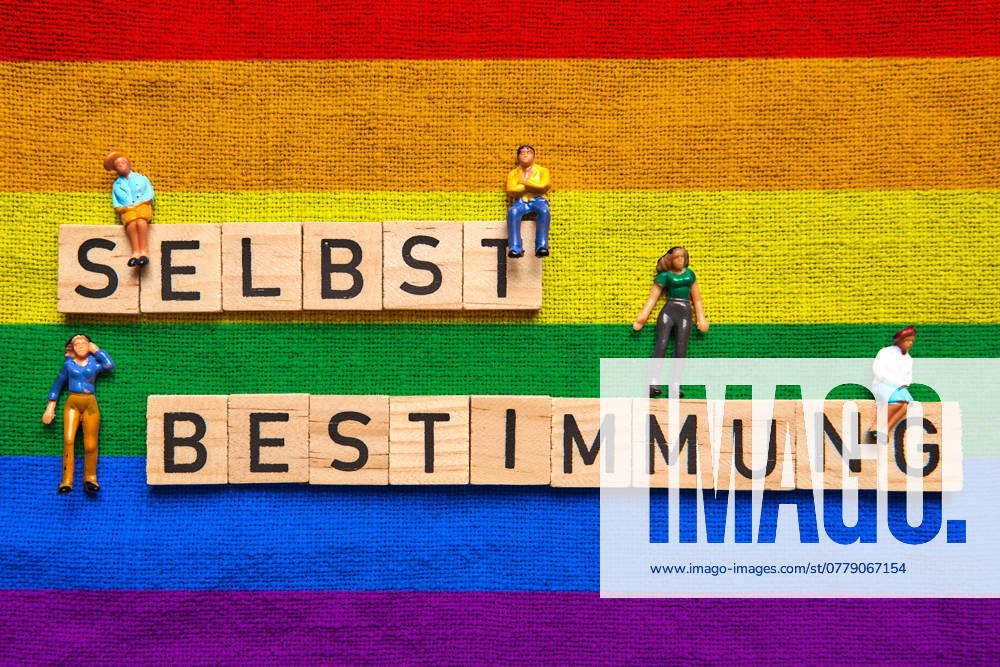 Self-determination relies on an LGBTQ+ or rainbow flag in relation to . Symbolic image Self-determination law, or transsexual law, gender identity or gender, identity and name easier to adapt to your own life reality.