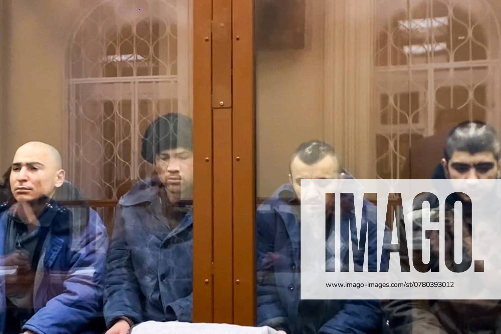 RUSSIA, MOSCOW - NOVEMBER 19, 2024: Saidakrami Rachabalizoda Murodali, Fariduni Shamsidin, Dalerzhon Mirzoyev and Mukhammadsobir Faizov (L-R) charged with involvement in the Crocus City Hall terrorist attack appear at Moscow s Basmanny District Court for a hearing into a prosecution bid to extend their custody time. Mikhail Tereshchenko TASS 76108701