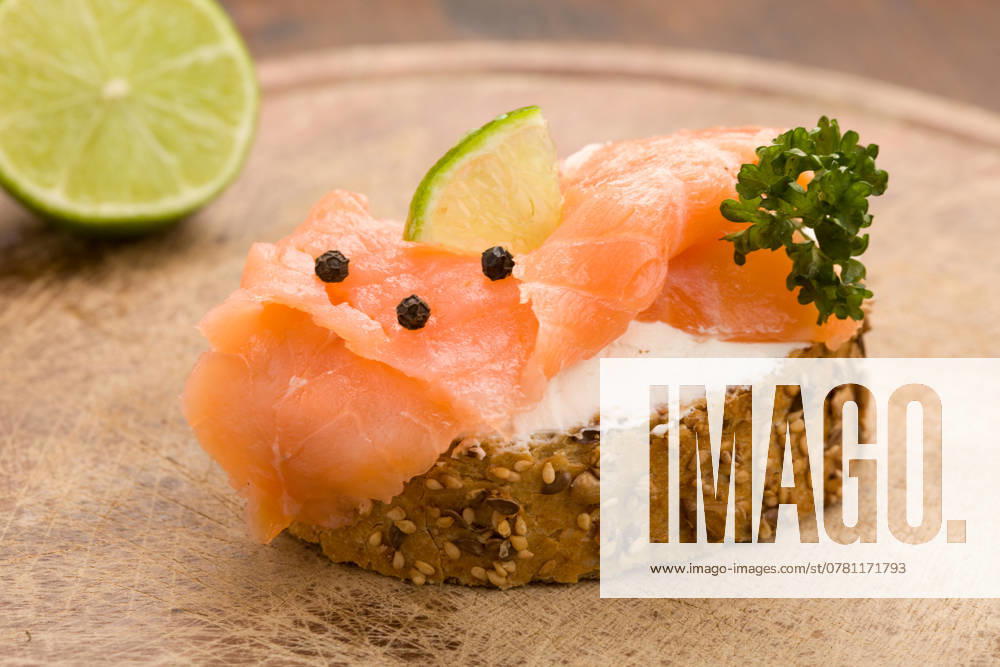 Photo of delicious crispy cereals bread with smoked salmon , 2186947.jpg, appetizer, black pepper, bread, Canap�, cereals, chopping parsley, cream, cream, creme fraiche, crispy, dairy products, eat light food, fish, food, hors d oeuvre, lime, onions, salmon, sandwiches, slice of cheese, smoked, snacks, spreads, tomatoes, wheat, RECORD DATE NOT STATED