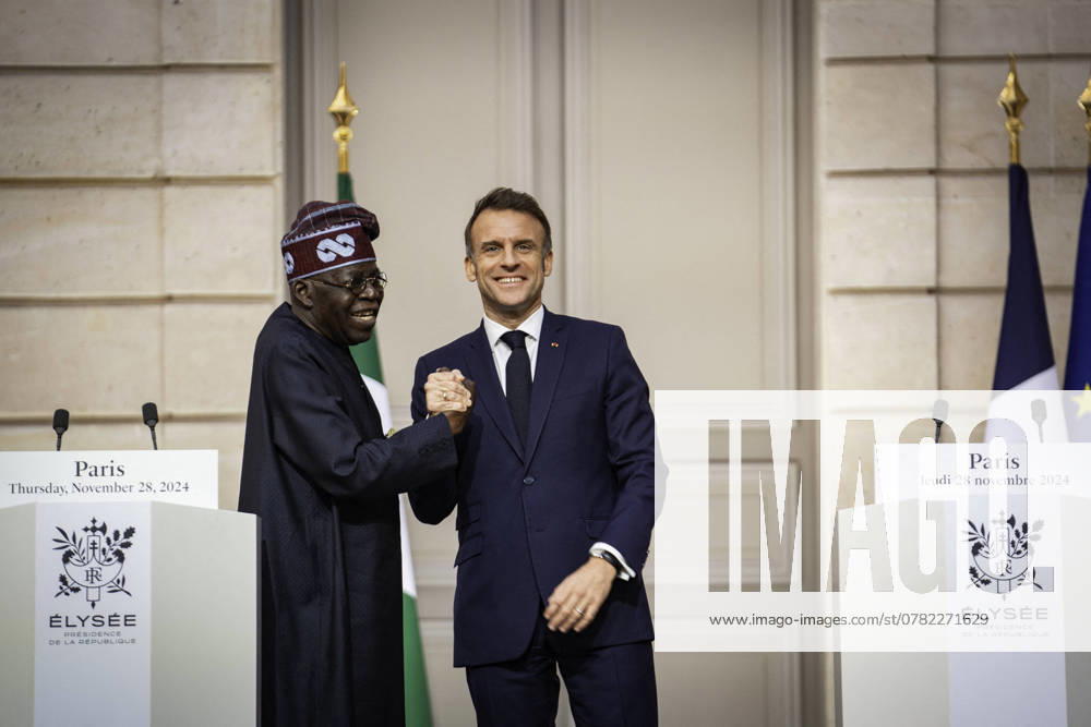 President Macron And President Tinubu Joint Press Conference - Paris French President Emmanuel Macron (R) and Nigerian president Bola Tinubu shake hands as theyr arrive to give a press conference following a meeting at the Elysee palace in Paris, on November 28, 2024. Photo by Gabrielle Cezard Pool ABACAPRESS.COM Paris France