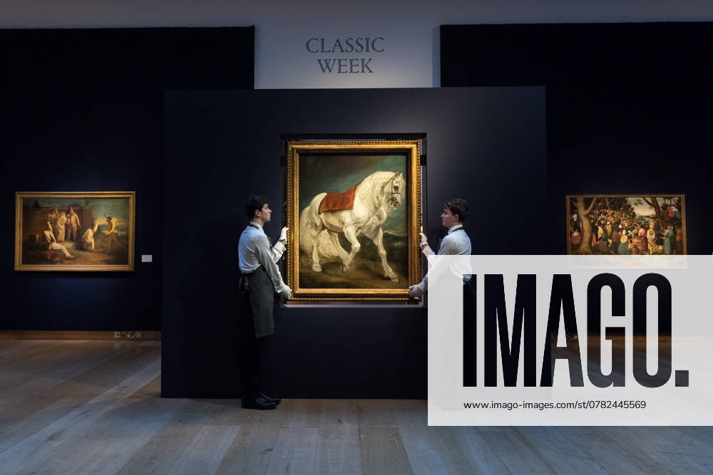 Bilder des Jahres 2024, Entertainment 11 November Christie s Classic Week Sale Highlights In London LONDON, UNITED KINGDOM - NOVEMBER 29, 2024: Art handlers hold a painting by Anthony van Dyck ˜An Andalusian Horse his first grand-scale depiction of a lone horse has an additional element of rarity and significance: his only surviving landscape in oil can be found hidden on the reverse of the original canvas (estimate: Â£2,000,000 3,000,000) during a photocall at Christie s auction house ahead of the Classic Week Sales in London, United Kingdom on November 29, 2024. London Greater London United Kingdom