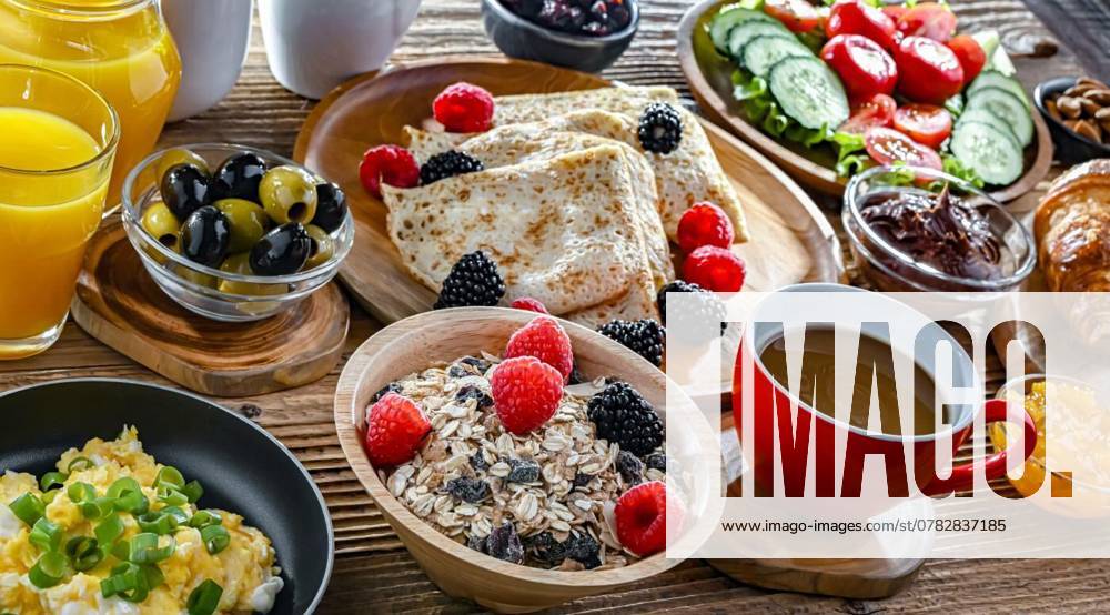 Breakfast served with coffee, eggs, cereals nd croissants, Breakfast served with coffee, orange juice, croissants, cereals, scrambled eggs and pancakes., Breakfast served with coffee, orange juice, croissants, cereals, scrambled eggs and pancakes., 03.11.2024,