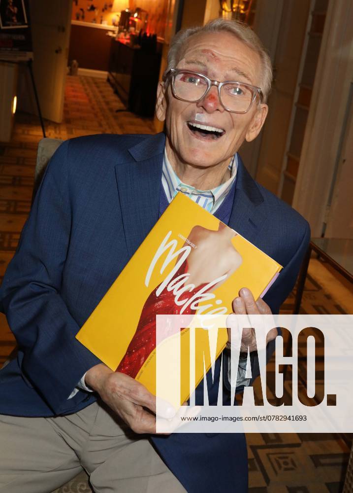 American fashion designer and costumier BOB MACKIE holds his UNMISTAKABLY MACKIE book at the press preview for the Hollywood Legends ‘Unmistakably Mackieâ€⠢ auction presented by Julienâ€⠢s Auctions and Turner Classic Movies held at the Carlyle Hotel. New York USA - ZUMAk03_ 20241202_zaf_k03_051