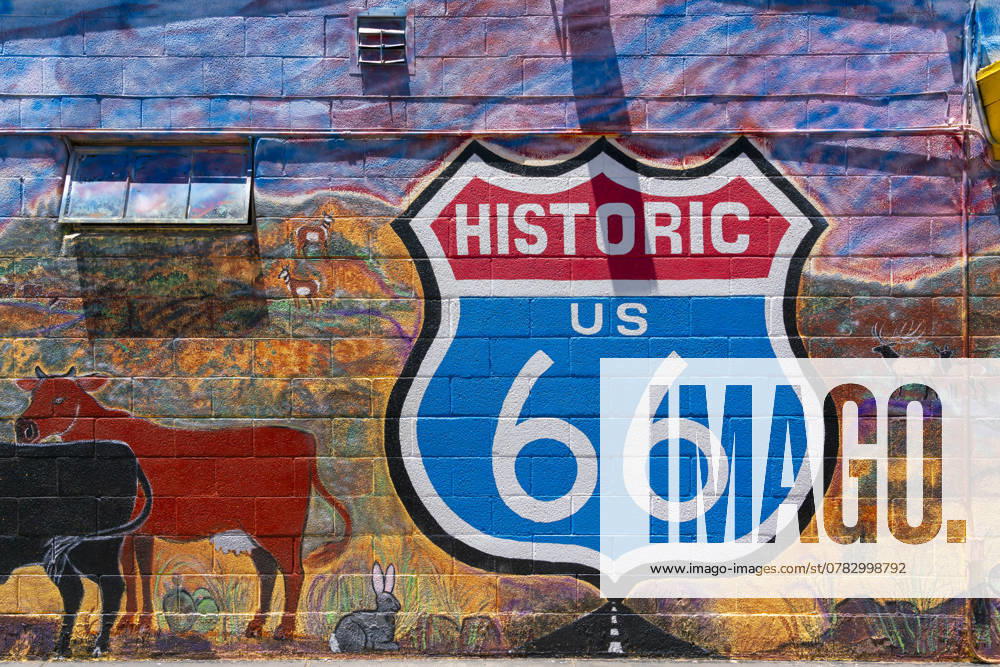 Painted Route 66 sign on wall, Seligman, Arizona, United States of America, North America