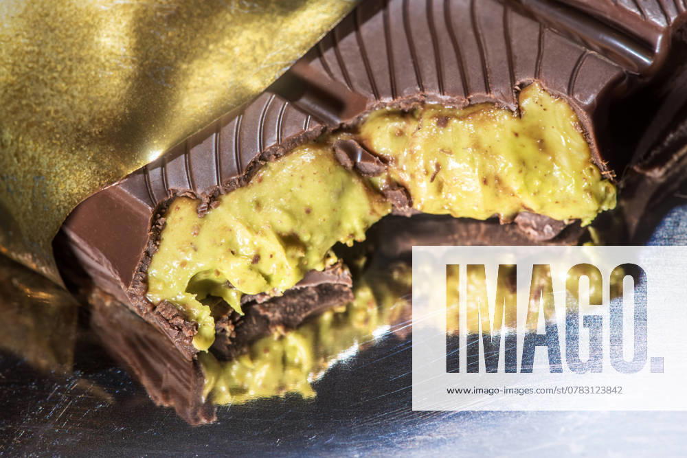 Dubai chocolate with kunafa and pistachio cream filling, hype about Dubai chocolate, Munich, December 2024 Germany, Munich, December 2024, Dubai chocolate with kunafa and pistachio cream filling, Alyan Dubai Handmade Chocolate brand, milk chocolate, produced by Alyan Food Production Import Export Industry, chocolate bar, hype about Du