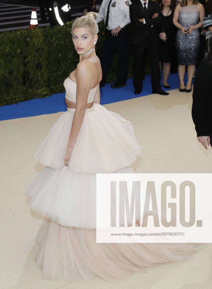 Hailey Baldwin arrives on the red carpet at the Costume Institute Benefit at The Metropolitan Museum of Art celebrating the opening of Rei Kawakubo Comme des Garcons: Art of the In-Between in New York City on May 1, 2017. NYP20170501603 JOHNxANGELILLO