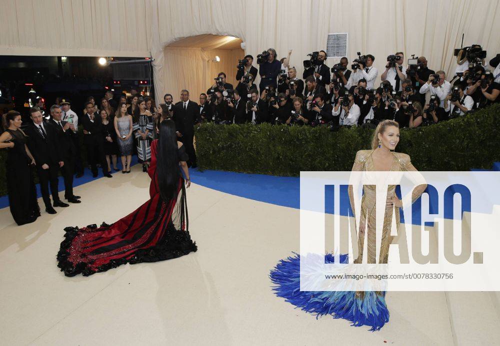 Blake Lively and Nicki Minaj arrive on the red carpet at the Costume Institute Benefit at The Metropolitan Museum of Art celebrating the opening of Rei Kawakubo Comme des Garcons: Art of the In-Between in New York City on May 1, 2017. NYP20170501608 JOHNxANGELILLO