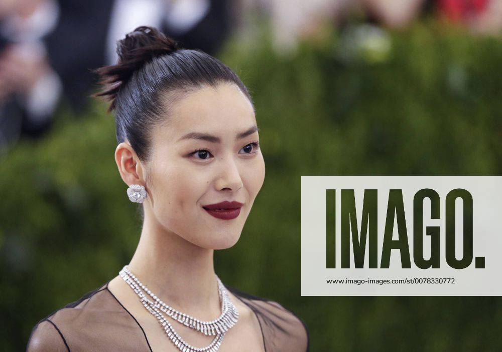 Liu Wen arrives on the red carpet at the Costume Institute Benefit at The Metropolitan Museum of Art celebrating the opening of Rei Kawakubo Comme des Garcons: Art of the In-Between in New York City on May 1, 2017. NYP20170501589 JOHNxANGELILLO
