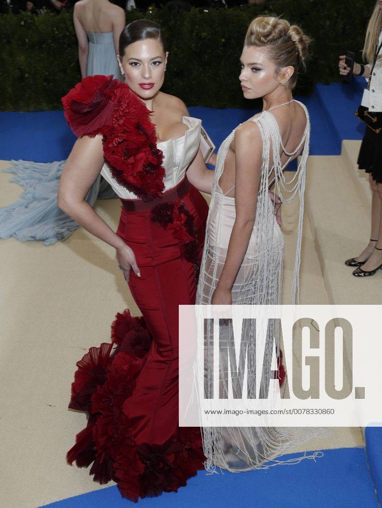 Stella Maxwell and Ashley Graham arrive on the red carpet at the Costume Institute Benefit at The Metropolitan Museum of Art celebrating the opening of Rei Kawakubo Comme des Garcons: Art of the In-Between in New York City on May 1, 2017. NYP20170501593 JOHNxANGELILLO