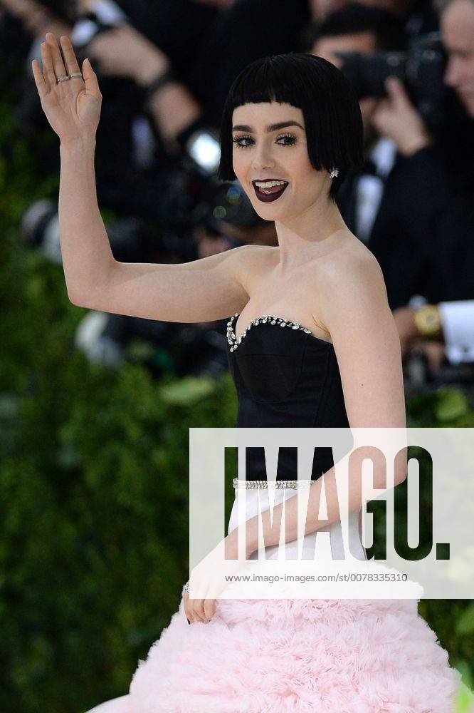 Arriving at the Rei Kawakubo Comme des Garcons: Art Of The In-Between Costume Institute Gala at the Metropolitan Museum of Art Lily Collins New York United States 513444