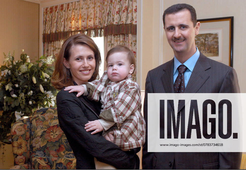Hacked Emails Expose Bashar al-Assad and Wife (Files) Syrian head of state Bashar al-Assad and London-born wife Asma al-Assad appear to live in a surreal psychological bubble, insulated from the grotesque violence that has claimed the lives of 8,000 Syrians, according to a cache of some 3,000 alleged emails and documents obtained by Syrian activists and published by the Guardian issue dated March 15, 2012. File photo : Ammar Abd Rabbo ABACA. EXCLUSIVE. 40867-10. London-UK, 18 12 2002. Syrian president Bashar Al Assad poses with wife Asma and their one year old son Hafez in London before their departure after a three day visit.