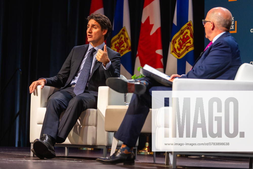 Prime Minister Justin Trudeau, left, attends a fireside chat with the Halifax Chamber of Commerce with Patrick Sullivan in Halifax on Monday December 9, 2024. Halifax Canada - ZUMAc35_ 20210717_zaf_c35_111