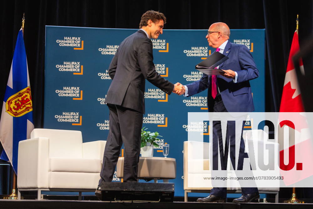 Prime Minister Justin Trudeau, left, attends a fireside chat with the Halifax Chamber of Commerce with Patrick Sullivan in Halifax on Monday December 9, 2024. Halifax Canada - ZUMAc35_ 20210717_zaf_c35_105
