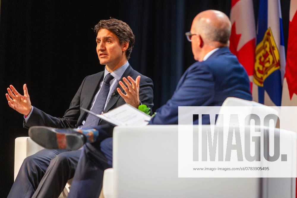 Prime Minister Justin Trudeau, left, attends a fireside chat with the Halifax Chamber of Commerce with Patrick Sullivan in Halifax on Monday December 9, 2024. Halifax Canada - ZUMAc35_ 20210717_zaf_c35_107