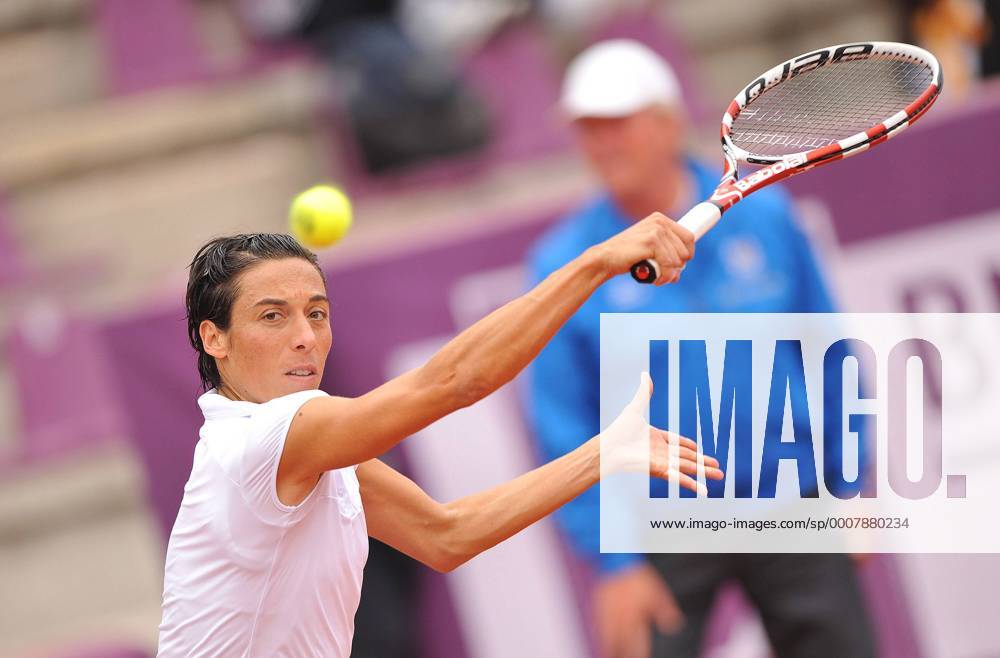 Francesca Schiavone from Italy plays a return during the women s singles quarterfinal match at WTA Tennis Damen Brussels Open tennis tournament in Brussels, Belgium, on May 19, 2011.
