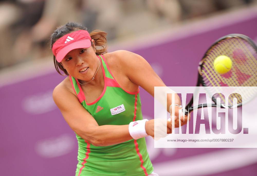 Morita Ayumi from Japan plays a return during the women s singles quarterfinal match at WTA Tennis Damen Brussels Open tennis tournament in Brussels, Belgium, on May 19, 2011.