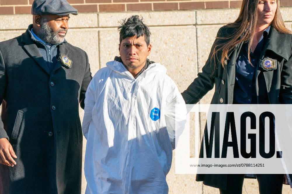 Sebastian Zapeta, suspected of burning a woman to death on a train, is taken from the New York Police Department 60th Precinct in Brooklyn on Monday, Dec. 23, 2024. Brooklyn United States of America - ZUMAm67_ 20241223_zaf_m67_012