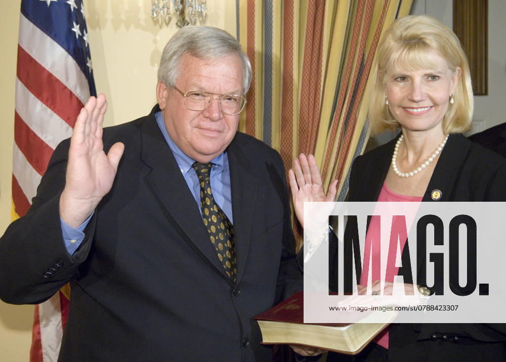 Hastert Gibbs Speaker of the House Dennis Hastert, R-Ill., left, conducts a mock swearing-in ceremony for Rep.-elect Shelley Sekula-Gibbs, R-Texas, on Monday Nov. 13, 2006, in Washington. She is filling the seat vacated by Tom Delay. Washington DC USA